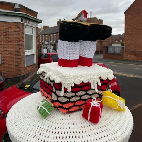 Steph Reston Christmas postbox topper in Stapleford