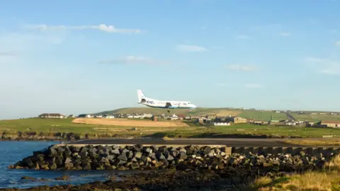 Getty Images Flybe landing at Sumburgh airport Shetland