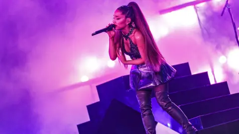 Getty Images Ariana Grande on stage