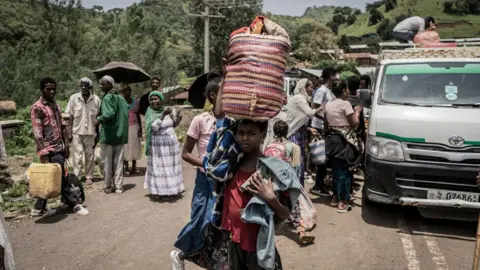 Getty Images Civilians fleeing fighting in Zarima, Amhara region of Ethiopia