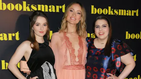 Getty Images Booksmart director Olivia Wilde (centre) with its stars Kaitlyn Dever (left) and Beanie Feldstein