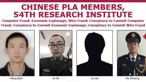 FBI A picture of the wanted poster for the four Chinese men