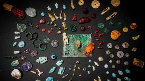 EPA Stones, bones and other artefacts on display in Pompeii (12 August)