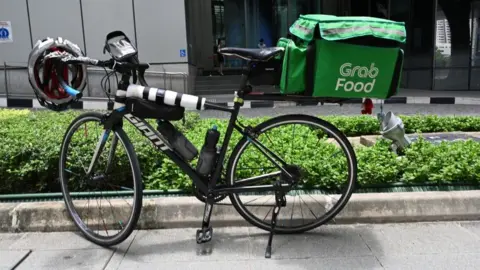 Getty Images Grab bike parked in Singapore