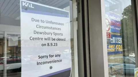 Olivia Richwald/BBC Sign on Dewsbury Sports Centre entrance