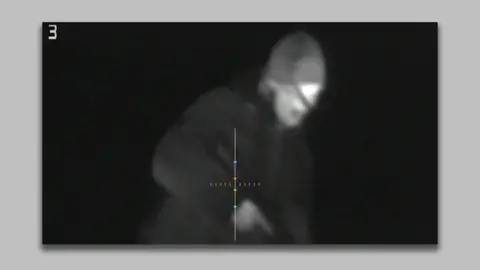 Southern Front Night vision footage of man holding a gun taken from report alleging a terror attack