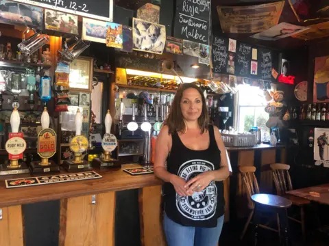 Justine Hatfield inside the Flying Pig which she runs with her husband, Matt.