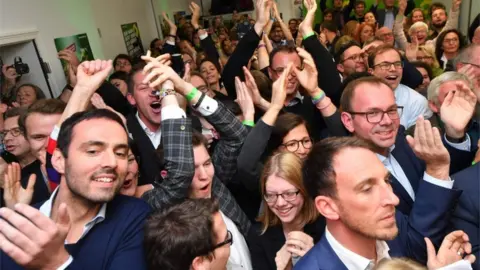 AFP/Getty Green Party supporters celebrate after a Hesse exit poll