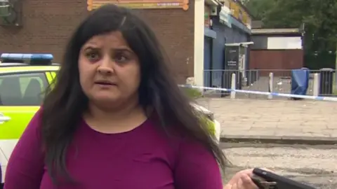 Sayeda speaking at the scene