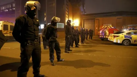 Reuters Riot officers