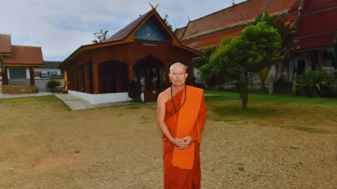 Panumas Sanguanwong/BBC Thai Kriangkrai Techamong as a monk