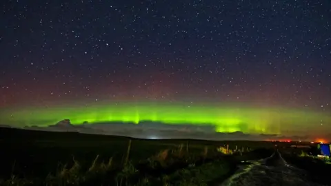 Mervyn Rendall  Aurora over shapinsay orkney by mervyn Rendall october 2020