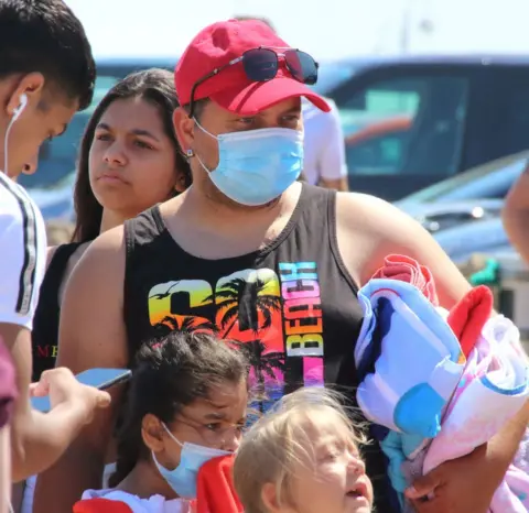 SOPA Images/Getty Images Man wearing a mask in Skegness