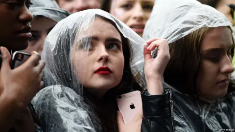 AFP/Getty Images The weather was, as usual, a mixture of rain and sunshine