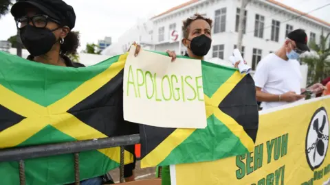 Getty Images Protest in Jamaica over slavery apology, March 2022