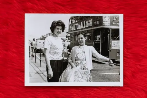 Jim Grover Dorfman's girlfriend, Anne with her daughter