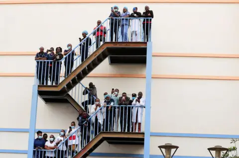 Thomas Mukoya/Reuters People on a staircase - 26 July 2023