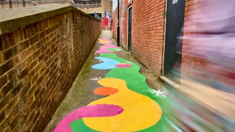 Tim Jobling Breakthrough mural in alleyway