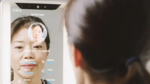 Care OS A woman using a smart mirror