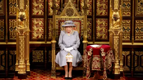 Getty Images Queen Elizabeth II sits on the Great Throne in the House of Lords