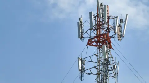 Getty Images Dangerous theories about 5G and Covid-19 have been spreading - encouraging some to attack mobile masts