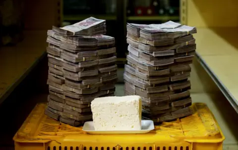 Reuters A kilogram of cheese next to 7,500,000 bolivars