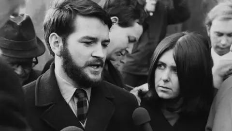 Getty Images 6 February 1970: Singer and Chairman of the Welsh Language Society Dafydd Iwan after his release from Cardiff jail. He was imprisoned for daubing English road signs with slogans