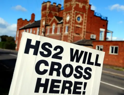 PA A sign saying HS2 will cross here in Staffordshire