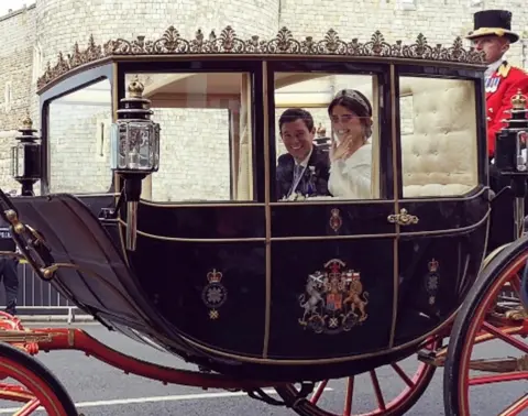 Amy Gardner  Princess Eugenie and Jack Brooksbank wave from their carriage