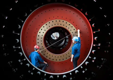 Costfoto/Barcroft Media via Getty Images Workers produce large building materials and equipment for export to countries along the Belt and Road. Hai 'an city, Jiangsu Province, China, June 15, 2020.