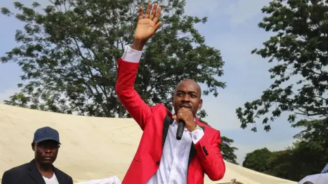 EPA 5 Movement For Democratic Change (MDC-T) new leader Nelson Chamisa (C) speaks to his supporters in Chinhoyi ,116 km west of Harare, Zimbabwe, 04 March 2018,