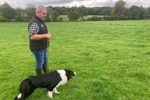 Allistair Lyttle with his sheepdog