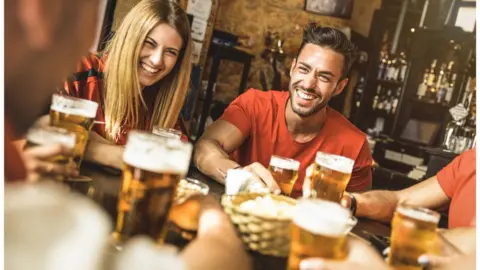 Getty Images People in a pub