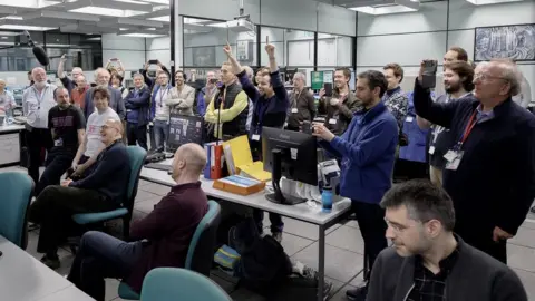 UK Atomic Energy Authority / EUROfusion Scientists celebrate in control room of JET