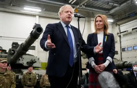 Reuters Boris Johnson at Tapa base