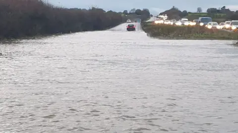 Julie Alliston-Croucher A wide image of the A303 submerged in flood waters