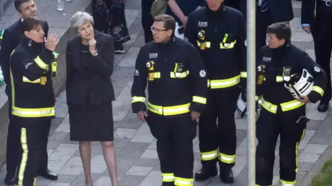 Getty Images Dany Cotton speaking to Theresa May