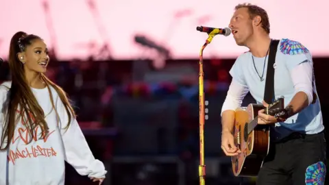 Dave Hogan for One Love Manchester Ariana Grande and Chris Martin