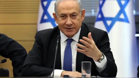 AFP Benjamin Netanyahu addresses a meeting of his right-wing bloc in the Israeli parliament in Jerusalem (20 November 2019)