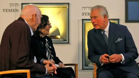 Getty Images/MENAHEM KAHANA The Prince of Wales with George Shefi and Marta Wise