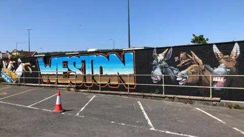 Steve Hayles  Weston mural featuring donkeys