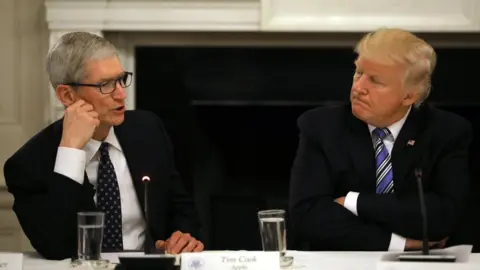 Reuters Tim Cook and Donald Trump in 2017