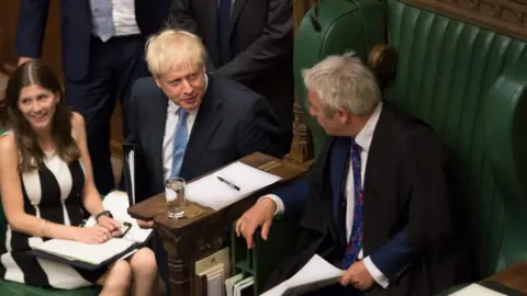 AFP/JESSICA TAYLOR/UK PARLIAMENT Boris Johnson looks at John Bercow