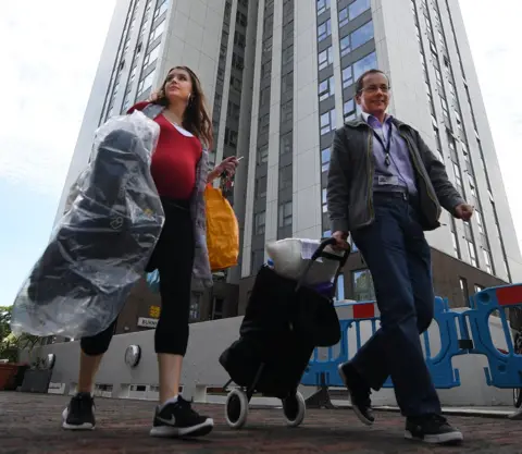 European Photopress Agency A couple evacuated from a Camden tower block installed with combustible cladding in June 2017