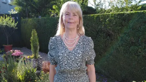 Welsh Water Christine in her garden before it flooded