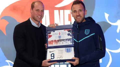 The FA/PA Wire Prince of Wales presenting Harry Kane with his England shirt