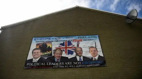 Reuters An anti-Northern Ireland Protocol poster hanging on a building in Lisburn