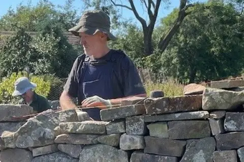 Paul Foster Paul Foster building a dry stone wall