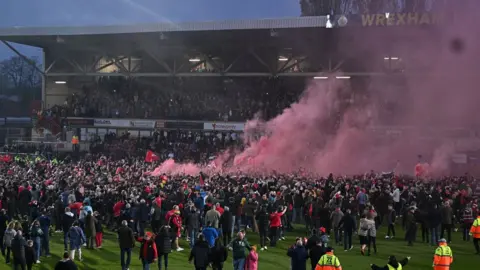 Getty Images Pitch invasion