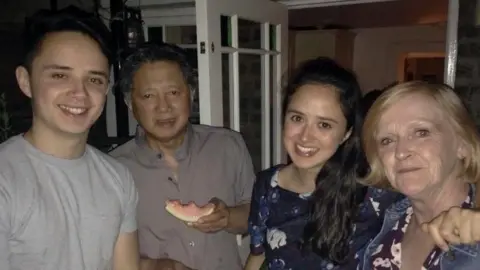 Safiah Safiah (second right) and family